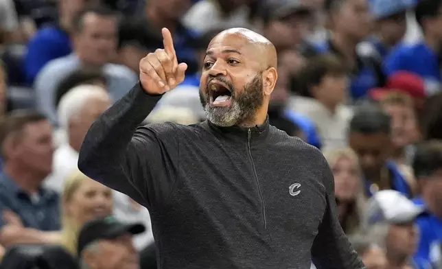 Cleveland Cavaliers head coach J.B. Bickerstaff shouts at his team during the first half of Game 6 of an NBA basketball first-round playoff series against the Orlando Magic, Friday, May 3, 2024, in Orlando, Fla. (AP Photo/John Raoux)