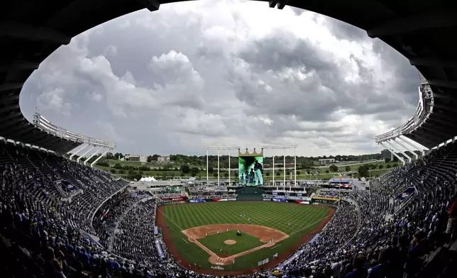 FILE - Clouds gather over Kauffman Stadium before a baseball game between the Kansas City Royals and the Cleveland Indians, on June 4, 2017, in Kansas City, Mo. Some Kansas lawmakers see a chance to lure Kansas City's two biggest professional sports teams across the Missouri border, but an effort to help the Super Bowl champion Chiefs and Major League Baseball's Royals finance new stadiums in Kansas fizzed over concerns about how it might look to taxpayers. (AP Photo/Charlie Riedel, File)