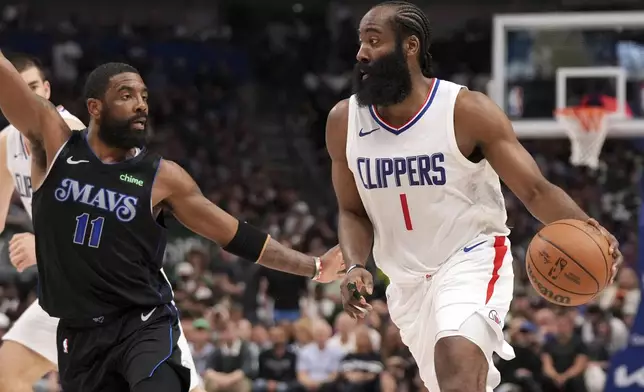 Los Angeles Clippers guard James Harden (1) drives against Dallas Mavericks guard Kyrie Irving (11) during the first half of Game 6 of an NBA basketball first-round playoff series Friday, May 3, 2024, in Dallas. (AP Photo/Jeffrey McWhorter)