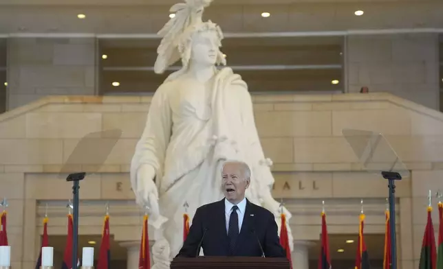 President Joe Biden speaks at the U.S. Holocaust Memorial Museum's Annual Days of Remembrance ceremony at the U.S. Capitol, Tuesday, May 7, 2024 in Washington. Statue of Freedom stands behind. (AP Photo/Evan Vucci)