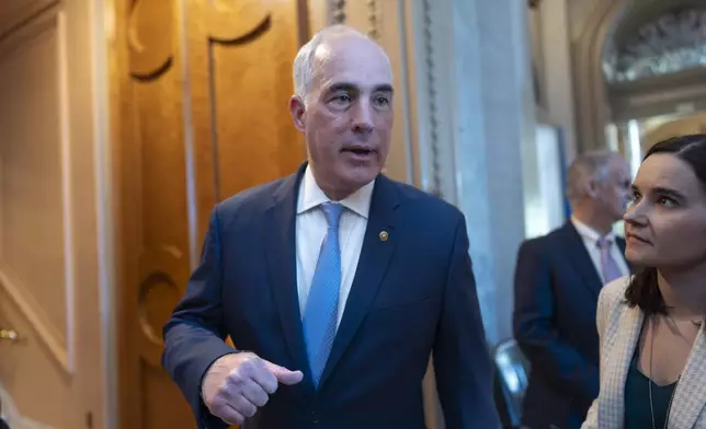 Sen. Bob Casey, D-Pa., arrives at the chamber as the Senate prepares to advance the $95 billion aid package for Ukraine, Israel and Taiwan passed by the House, at the Capitol in Washington, Tuesday, April 23, 2024. (AP Photo/J. Scott Applewhite)