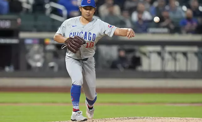 Chicago Cubs pitcher Shota Imanaga, of Japan, throws out New York Mets' Starling Marte at first base during the third inning of a baseball game, Wednesday, May 1, 2024, in New York. (AP Photo/Frank Franklin II)