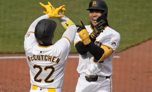 Pittsburgh Pirates' Connor Joe, right, celebrates with Andrew McCutchen (22) after hitting a three-run home run off Chicago Cubs starting pitcher Justin Steele during the third inning of a baseball game in Pittsburgh, Saturday, May 11, 2024. (AP Photo/Gene J. Puskar)