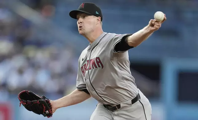 Arizona Diamondbacks starting pitcher Joe Mantiply throws to a Los Angeles Dodgers batter during the first inning of a baseball game Monday, May 20, 2024, in Los Angeles. (AP Photo/Marcio Jose Sanchez)