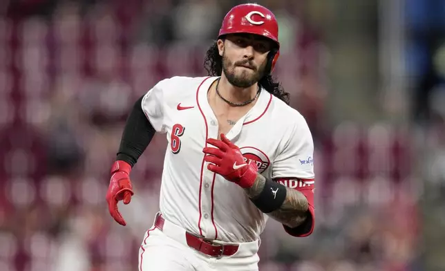 Cincinnati Reds' Jonathan India rounds the bases after hitting a solo home run during the seventh inning of a baseball game against the Arizona Diamondbacks Tuesday, May 7, 2024, in Cincinnati. (AP Photo/Jeff Dean)