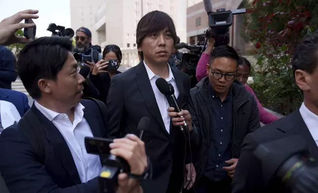 Ippei Mizuhara, the former longtime interpreter for the Los Angeles Dodgers baseball star Shohei Ohtani, leaves federal court following his arraignment, Tuesday, May 14, 2024, in Los Angeles. Mizuhara pleaded not guilty Tuesday to bank and tax fraud, a formality ahead of a plea deal he’s negotiated with federal prosecutors in a wide-ranging sports betting case. (AP Photo/Eric Thayer)