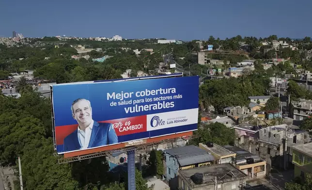 A billboard of presidential incumbent candidate Luis Abinader in Santo Domingo, Dominican Republic, Thursday, May 16, 2024. Dominican Republic will hold general elections on May 19. (AP Photo/Matias Delacroix)
