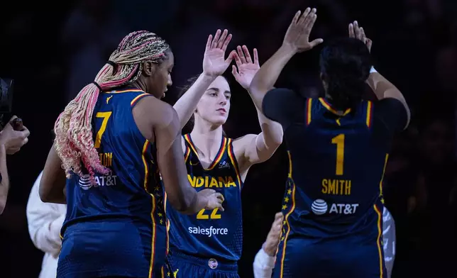 Indiana Fever guard Caitlin Clark (22) is introduced before the team's preseason WNBA basketball game against the Atlanta Dream in Indianapolis, Thursday, May 9, 2024. (AP Photo/Darron Cummings)