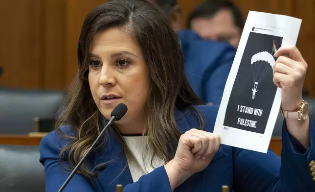 Rep. Elise Stefanik, R-N.Y., hołds up a printout that she claims was from a New York City public school teacher's social media account, during a Subcommittee on Early Childhood, Elementary, and Secondary Education hearing on antisemitism in K-12 public schools, Wednesday, May 8, 2024, on Capitol Hill in Washington. (AP Photo/Jacquelyn Martin)