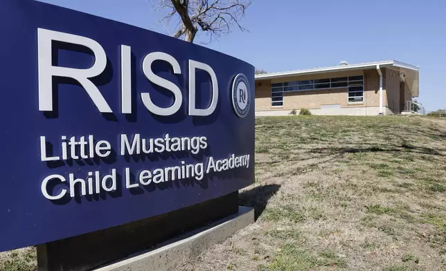 A sign for Richardson ISD's Little Mustangs Child Learning Academy stands Wednesday, Feb. 21, 2024, in Richardson, Texas. (Elías Valverde II/The Dallas Morning News via AP)