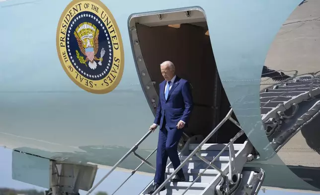 President Joe Biden arrives at Milwaukee Mitchell International Airport, Wednesday, May 8, 2024, in Milwaukee. (AP Photo/Evan Vucci)