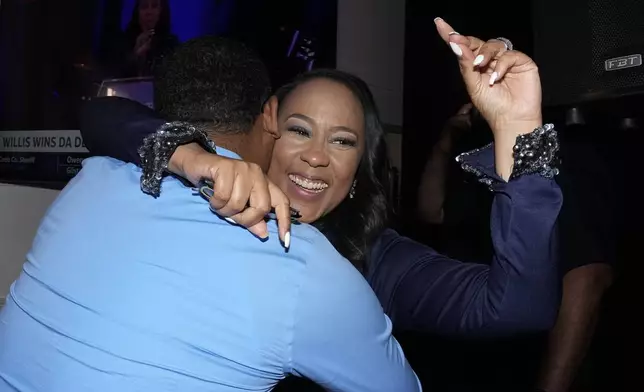 Fulton County District Attorney Fani Willis celebrates winning re-election in the primary on Tuesday, May 21, 2024, in Buckhead, Ga. (AP Photo/Brynn Anderson)