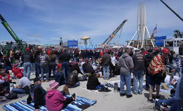 People gather ahead of a campaign rally for Republican presidential candidate former President Donald Trump in Wildwood, N.J., Saturday, May 11, 2024. (AP Photo/Matt Rourke)