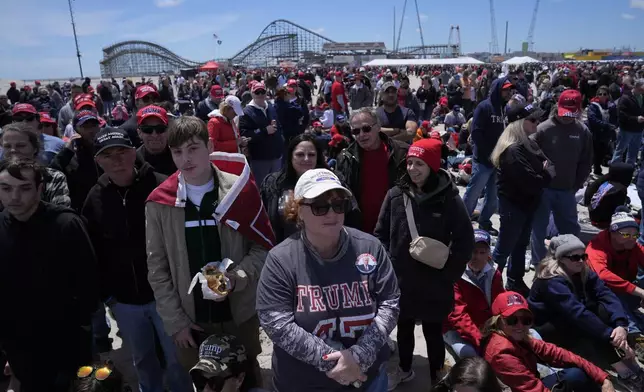 People gather ahead of a campaign rally for Republican presidential candidate former President Donald Trump in Wildwood, N.J., Saturday, May 11, 2024. (AP Photo/Matt Rourke)