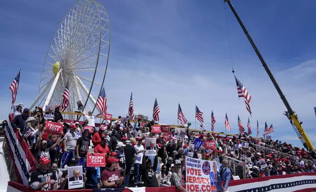 People gather ahead of a campaign rally for Republican presidential candidate former President Donald Trump in Wildwood, N.J., Saturday, May 11, 2024. (AP Photo/Matt Rourke)