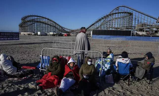People gather ahead of a campaign rally for Republican presidential candidate former President Donald Trump in Wildwood, N.J., Saturday, May 11, 2024. (AP Photo/Matt Rourke)