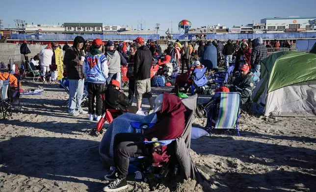 People gather ahead of a campaign rally for Republican presidential candidate former President Donald Trump in Wildwood, N.J., Saturday, May 11, 2024. (AP Photo/Matt Rourke)