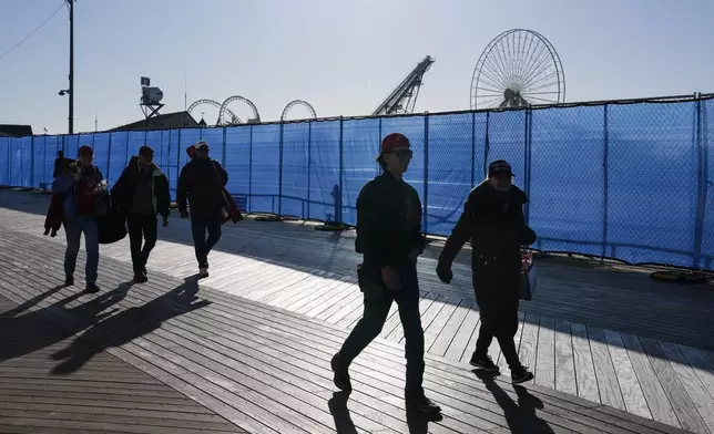 People gather ahead of a campaign rally for Republican presidential candidate former President Donald Trump in Wildwood, N.J., Saturday, May 11, 2024. (AP Photo/Matt Rourke)
