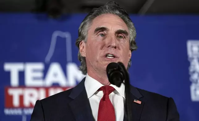 FILE - North Dakota Gov. Doug Burgum speaks at a campaign rally with Republican presidential candidate former President Donald Trump in Laconia, N.H., Monday, Jan. 22, 2024. (AP Photo/Matt Rourke, File)