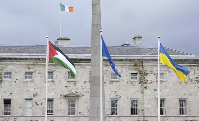 The Palestinian flag flies outside Leinster House, Dublin, following the decision by the Government to formally recognise the Palestinian state, Tuesday May 28, 2024. (Niall Carson/PA via AP)