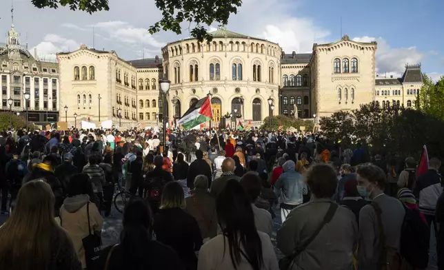 FILE - People gather in support of the Palestinain people, amid the conflict with Israel, in front of the parliament building in Oslo, Norway, on May 19, 2021. European Union countries Spain and Ireland as well as Norway on Wednesday announced dates for recognizing Palestine as a state. (Berit Roald/NTB via AP, File)