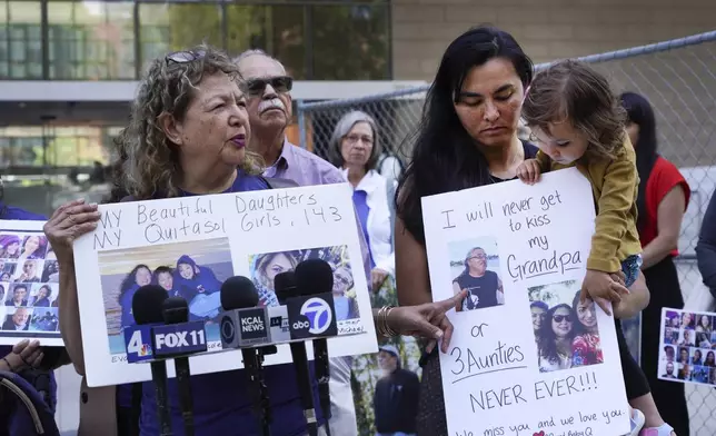 Susana Solano-Rosas, left, talks to the media about her daughters who died in the Conception dive boat fire in front of the U.S. Federal Building in downtown Los Angeles on Thursday, May 2, 2024. A federal judge on Thursday sentenced the scuba dive boat captain, Jerry Boylan to four years in prison and three years supervised release for criminal negligence after 34 people died in a fire aboard the vessel. (AP Photo/Richard Vogel)