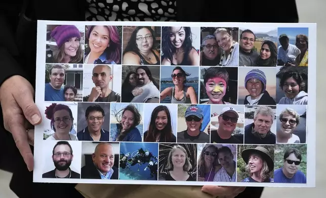 FILE - A photo collage of the 34 victims of the Sept. 2, 2019 fire aboard the dive boat Conception, at Santa Cruz Island, is held by a family member arriving at federal court in Los Angeles, Oct. 25, 2023. The captain of the boat is scheduled to be sentenced by a federal judge Thursday, May 2, 2024, on a conviction of criminal negligence. (AP Photo/Damian Dovarganes, File)