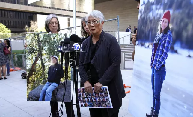 Barbara Chan talks to the media about her brother, Scott and niece Kendra who were both killed in the Conception boat fire in front of the U.S. Federal Building in downtown Los Angeles on Thursday, May 2, 2024. A federal judge on Thursday sentenced the scuba dive boat captain, Jerry Boylan to four years in prison and three years supervised release for criminal negligence after 34 people died in a fire aboard the vessel. (AP Photo/Richard Vogel)