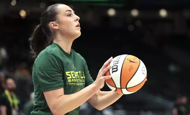 Seattle Storm guard Nika Muhl warms up for the team's WNBA basketball game against the Indiana Fever, Wednesday, May 22, 2024, in Seattle. (AP Photo/Jason Redmond)