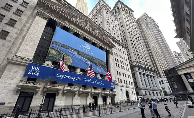 A banner for cruise operator Viking, marking its initial public offering, hangs on the front of the New York Stock Exchange on Wednesday, May 1, 2024 in New York. (AP Photo/Peter Morgan)