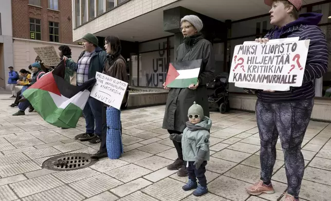 Supporters of Palestinians attend a protest rally outside the Helsinki University in Helsinki, Finland, Monday, May 6, 2024. Demonstrators are demanding boycott against Israeli universities. (Roni Rekomaa/Lehtikuva via AP)