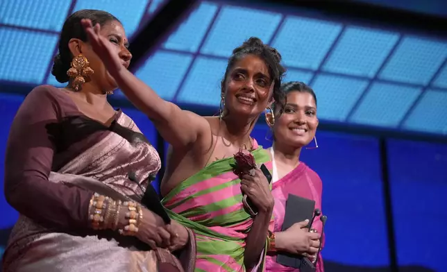 Chhaya Kadam, from left, Kani Kusruti, and Divya Prabha accept the grand prize award for 'All We Imagine as Light,' alongside Viola Davis, far right, during the awards ceremony of the 77th international film festival, Cannes, southern France, Saturday, May 25, 2024 (Photo by Andreea Alexandru/Invision/AP)