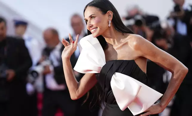 Demi Moore poses for photographers upon arrival at the awards ceremony during the 77th international film festival, Cannes, southern France, Saturday, May 25, 2024. (Photo by Scott A Garfitt/Invision/AP)