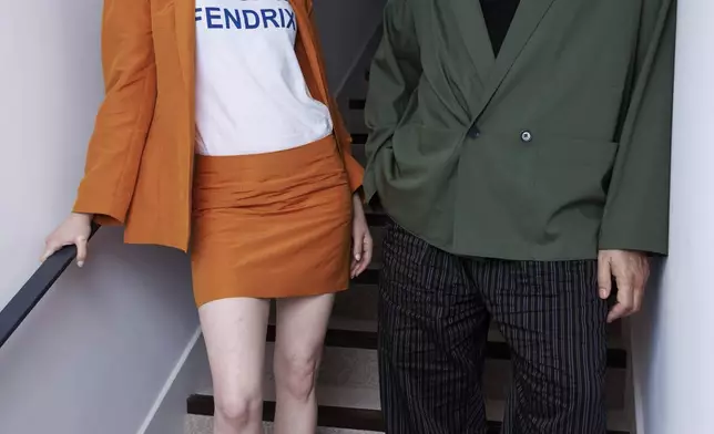 Emma Stone, left, and director Yorgos Lanthimos pose for a portrait photograph for the film 'Kinds of Kindness' at the 77th international film festival, Cannes, southern France, Saturday, May 18 2024. (Photo by Vianney Le Caer/Invision/AP)