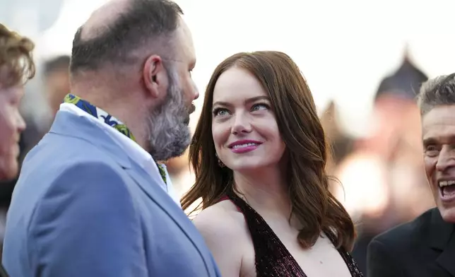 Director Yorgos Lanthimos, left, and Emma Stone pose for photographers upon arrival at the premiere of the film 'Kinds of Kindness' at the 77th international film festival, Cannes, southern France, Friday, May 17, 2024. (Photo by Scott A Garfitt/Invision/AP)
