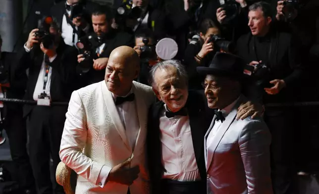 Laurence Fishburne, from left, director Francis Ford Coppola, and Giancarlo Esposito pose for photographers upon departure at the premiere of the film 'Megalopolis' at the 77th international film festival, Cannes, southern France, Thursday, May 16, 2024. (Photo by Millie Turner/Invision/AP)