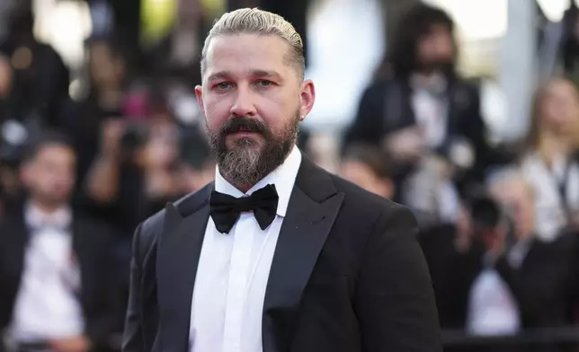 Shia LaBeouf poses for photographers upon arrival at the premiere of the film 'Megalopolis' at the 77th international film festival, Cannes, southern France, Thursday, May 16, 2024. (Photo by Scott A Garfitt/Invision/AP)