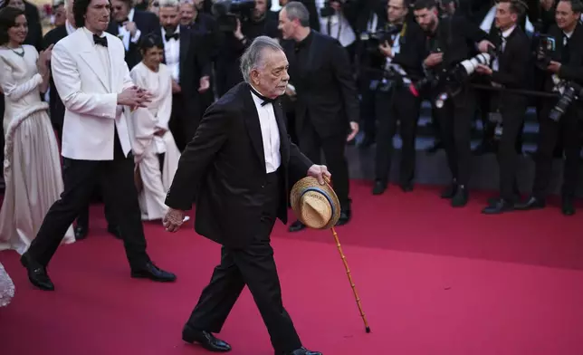 Director Francis Ford Coppola poses for photographers upon arrival at the premiere of the film 'Megalopolis' at the 77th international film festival, Cannes, southern France, Thursday, May 16, 2024. (Photo by Daniel Cole/Invision/AP)