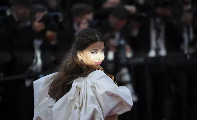 Aishwarya Rai Bachchan poses for photographers upon arrival at the premiere of the film 'Megalopolis' at the 77th international film festival, Cannes, southern France, Thursday, May 16, 2024. (Photo by Daniel Cole/Invision/AP)