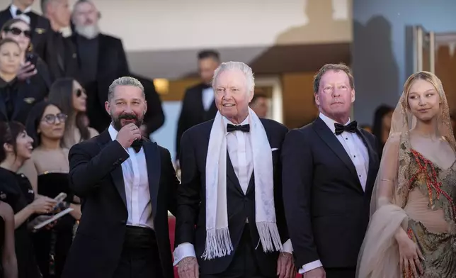 Shia LaBeouf, from left, Jon Voight, D. B. Sweeney, and Grace VanderWaal pose for photographers upon arrival at the premiere of the film 'Megalopolis' at the 77th international film festival, Cannes, southern France, Thursday, May 16, 2024. (Photo by Andreea Alexandru/Invision/AP)