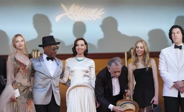 Grace VanderWaal, from left, Giancarlo Esposito, Aubrey Plaza, director Francis Ford Coppola, Romy Mars and Adam Driver pose for photographers upon arrival at the premiere of the film 'Megalopolis' at the 77th international film festival, Cannes, southern France, Thursday, May 16, 2024. (Photo by Scott A Garfitt/Invision/AP)