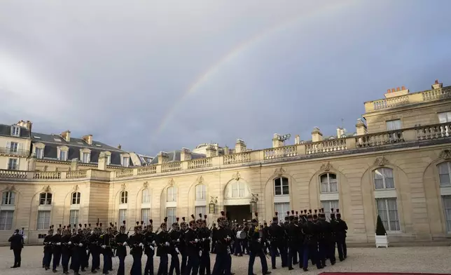 A rainbow is seen from the Elysee Palace as French President Emmanuel Macron hosts a state diner for China's President Xi Jinping, Monday, May 6, 2024 in Paris. (AP Photo/Thibault Camus)