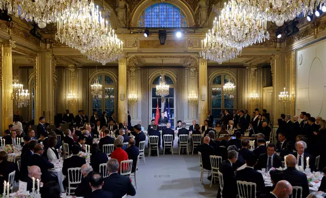 French President Emmanuel Macron speaks during a toast at a state dinner hosted for Chinese President Xi Jinping, at the Elysee Palace in Paris, Monday, May 6, 2024. French President Emmanuel Macron put trade disputes and Ukraine-related diplomatic efforts on top of the agenda for talks with Chinese President Xi Jinping, who arrived in France for a two-day state visit opening his European tour. (Ludovic Marin, Pool via AP)