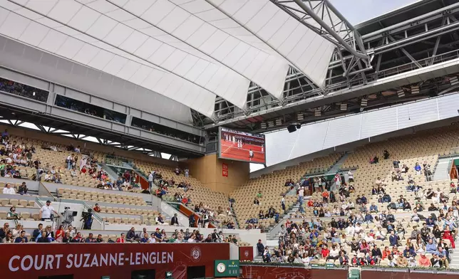 The new roof over Suzanne Lenglen court is seen ahead of first round match of the French Open tennis tournament at the Roland Garros stadium in Paris, Sunday, May 26, 2024. (AP Photo/Jean-Francois Badias)