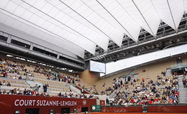 The new roof over Suzanne Lenglen court closed ahead of first round match of the French Open tennis tournament at the Roland Garros stadium in Paris, Sunday, May 26, 2024. (AP Photo/Jean-Francois Badias)