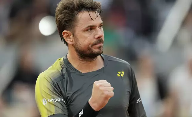 Switzerland's Stan Wawrinka reacts during his first round match against Britain's Andy Murray of the French Open tennis tournament at the Roland Garros stadium in Paris, Sunday, May 26, 2024. (AP Photo/Thibault Camus)