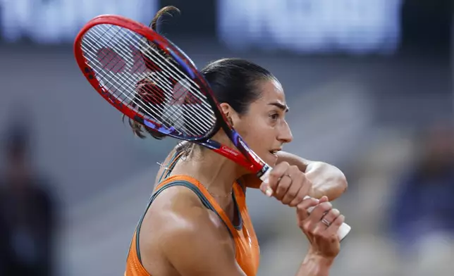 France's Caroline Garcia plays a shot against Germany's Eva Lys during their first round match of the French Open tennis tournament at the Roland Garros stadium in Paris, Sunday, May 26, 2024. (AP Photo/Jean-Francois Badias)