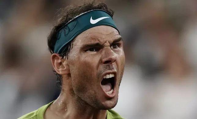 FILE -Spain's Rafael Nadal celebrates winning the first set against Germany's Alexander Zverev during their semifinal match at the French Open tennis tournament in Roland Garros stadium in Paris, France, Friday, June 3, 2022. Rafael Nadal is in the French Open field, after all, and the 14-time champion was set up for a challenging first-round matchup in Thursday’s, May 23, 2024, draw against Alexander Zverev. (AP Photo/Thibault Camus, File)