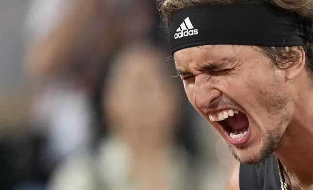 FILE - Germany's Alexander Zverev reacts as he plays Spain's Rafael Nadal during their semifinal match of the French Open tennis tournament at the Roland Garros stadium Friday, June 3, 2022 in Paris. Rafael Nadal is in the French Open field, after all, and the 14-time champion was set up for a challenging first-round matchup in Thursday’s, May 23, 2024, draw against Alexander Zverev.(AP Photo/Michel Euler, File)