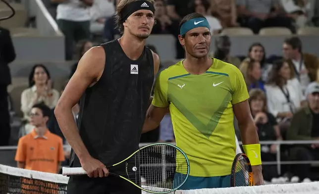 FILE - Spain's Rafael Nadal, right, and Germany's Alexander Zverev pose before their semifinal of the French Open tennis tournament at the Roland Garros stadium Friday, June 3, 2022 in Paris. Plenty of folks have vivid recollections of seeing Nadal display his relentless excellence on a tennis court. That includes the many players who have been on the other side of the net for at least one of his 1,299 professional matches.(AP Photo/Michel Euler, File)